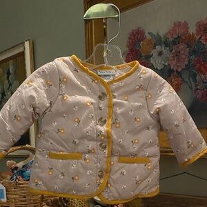 Nicole Miller NY quilted baby jacket with light floral pattern/mustard trim 3-6M
